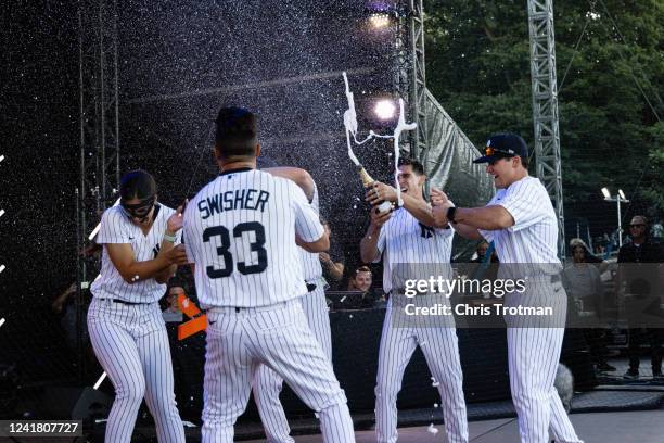 The New York Yankees team celebrate winning the first leg of the HRDX during the FTX MLB Home Run Derby X at Crystal Palace Park on Saturday, July 9,...