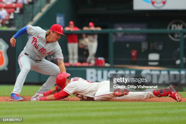 Lars Nootbaar of the St. Louis Cardinals slides safely into second base against Bryson Stott of the Philadelphia Phillies in the fifth inning at...