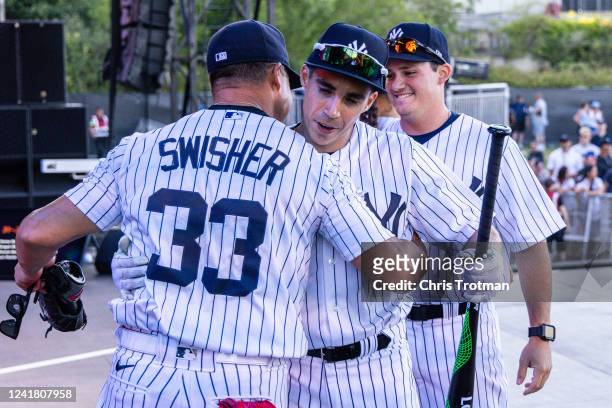 Wild Card Daniel Corral and Legend Nick Swisher of the New York Yankees in action during the FTX MLB Home Run Derby X at Crystal Palace Park on...