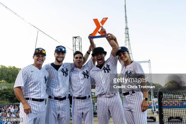 The New York Yankees team celebrate winning the first leg of the HRDX during the FTX MLB Home Run Derby X at Crystal Palace Park on Saturday, July 9,...