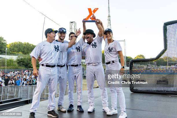 The New York Yankees team celebrate winning the first leg of the HRDX during the FTX MLB Home Run Derby X at Crystal Palace Park on Saturday, July 9,...