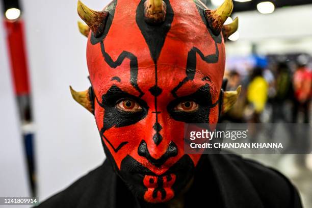 Alberto Martinez a cosplayer dressed as Darth Maul poses during the "Florida Supercon" comic convention at the Miami Beach Convention Center in Miami...