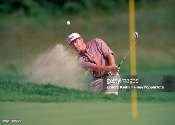 Jeff Maggert of the United States chips out of the bunker during the US Open Golf Championship at Shinnecock Hills Golf Club in Southampton, New...