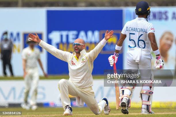 Australia's Nathan Lyon unsuccessfully appeals for a leg before wicket against Sri Lanka's Angelo Mathews during the third day of second cricket Test...