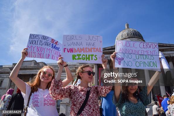 Pro Choice Argument Examples Protesters hold pro-choice and abortion rights placards during the ...