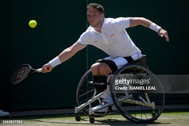 Britain's Alfie Hewett returns the ball to Japan's Shingo Kunieda during their men's wheelchair singles final tennis match on the fourteenth day of...