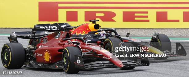 Ferrari's Monegasque driver Charles Leclerc and Red Bull Racing's Dutch driver Max Verstappen compete on the Red Bull Ring race track in Spielberg,...
