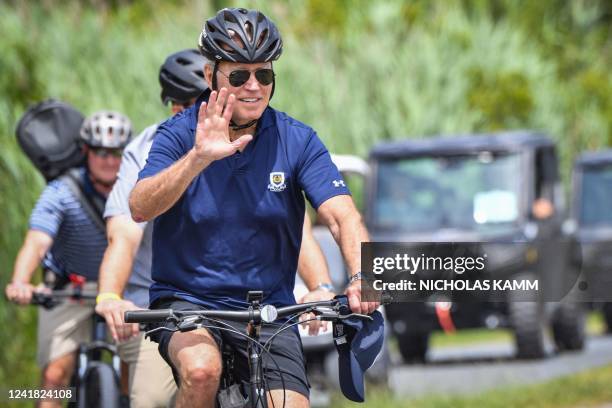 President Joe Biden rides a bike through Gordons Pond State Park in Rehoboth Beach, Delaware on July 10, 2022. / "The erroneous mention[s] appearing...