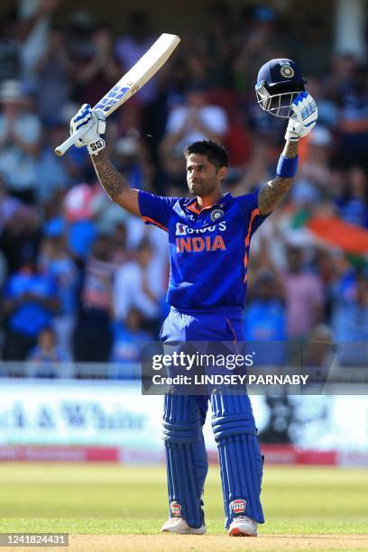 India's Suryakumar Yadav celebrates after reaching his 100 during the '3rd Vitality IT20' Twenty20 International cricket match between England and...