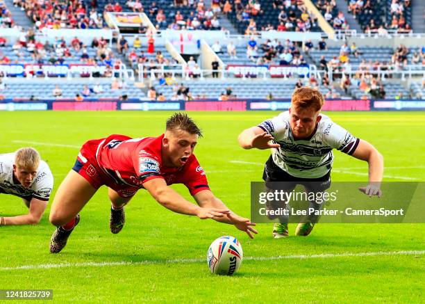 Mikey Lewis of Hull KR scores a try in the 40th minute to make 14-14 during the Betfred Super League Magic Weekend match between Hull Kingston Rovers...