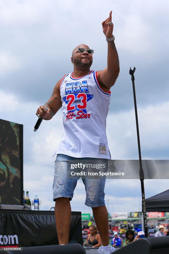 Flo-Rida performs prior to the 53rd Annual Quaker State 400 NASCAR ...