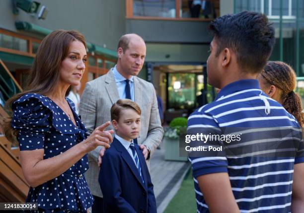 The Duke and Duchess of Cambridge with Prince George speak with Ball Boys & Ball Girls Syed Are, Dior Knorr and Amy Grange on their arrival on day...