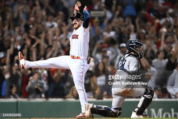 Alex Verdugo of the Boston Red Sox celebrates after scoring a run in the seventh inning against the New York Yankees at Fenway Park on July 10, 2022...