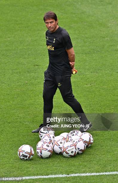 Tottenham Hotspur's head coach Antonio Conte attends at an open training session at Seoul World Cup Stadium in Seoul on July 11 on their football...