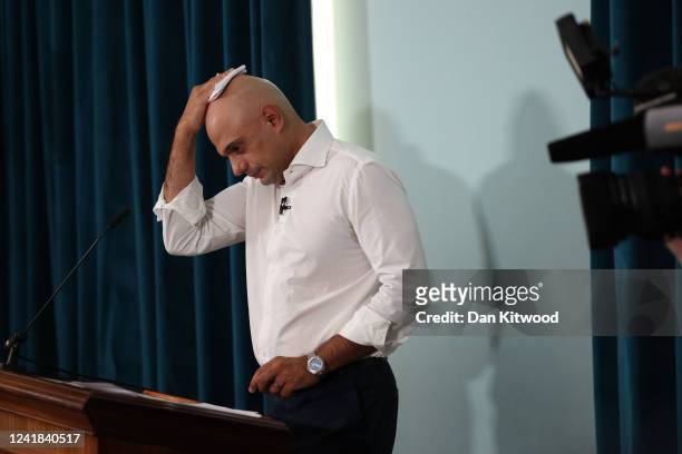 Former Health Minister Sajid Javid wipes away sweat as he launches bid to be the next Conservative Party Leader on July 11, 2022 in London, England....