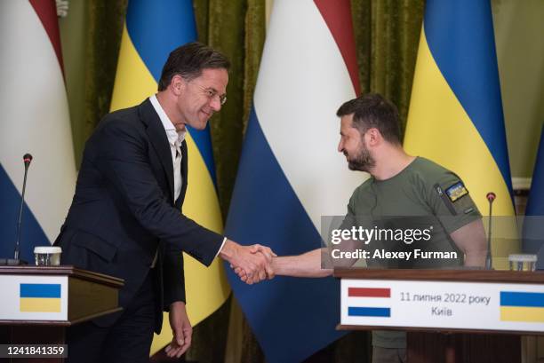 Dutch Prime Minister, Mark Rutte and Ukrainian President Volodymyr Zelensky shake hands during a joint press conference on July 11, 2022 in Kyiv,...