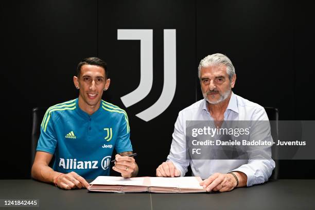 Angel Di Maria Signs For Juventus with Maurizio Arrivabene at Juventus headquarters on July 11, 2022 in Turin, Italy.