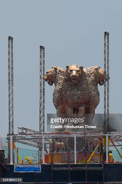 View of the Bronze National Emblem cast on the roof of the new Parliament Building on July 11, 2022 in New Delhi, India.