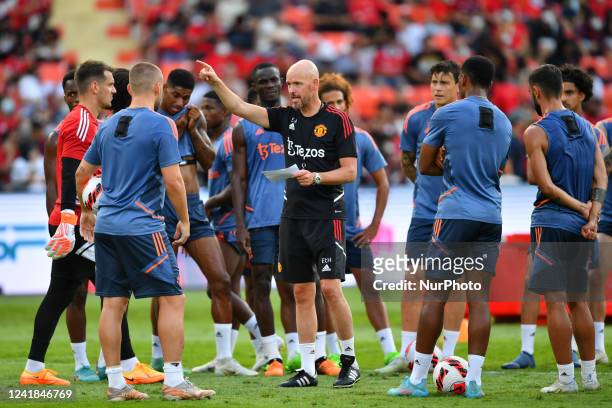 Manchester United's manager Erik Ten Hag [R] in action during the training session before match against Liverpool at Rajamangala stadium on July 11,...