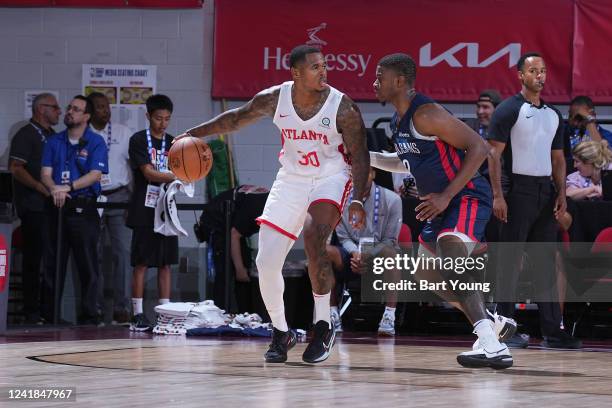 Marcus Georges-Hunt of the Atlanta Hawks dribbles the ball against the New Orleans Pelicans during the 2022 NBA Summer League on July 11, 2022 at the...