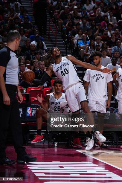 Las Vegas, NV Javin DeLaurier of the San Antonio Spurs looks to pass the ball against the Houston Rockets during the 2022 Summer League on July 11,...