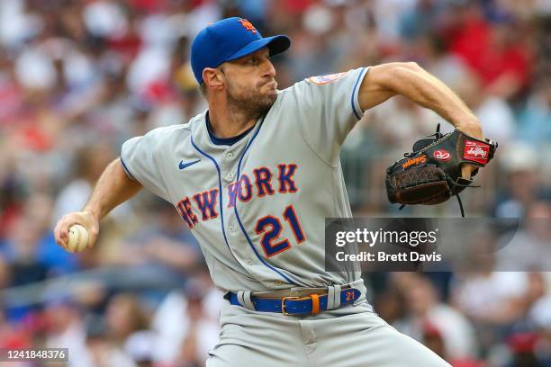 Max Scherzer of the New York Mets pitches against the Atlanta Braves in the first inning at Truist Park on July 11, 2022 in Atlanta, Georgia.