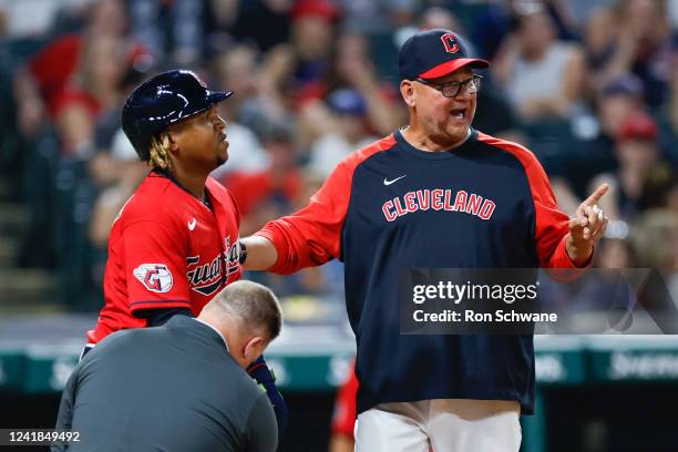 Terry Francona of the Cleveland Guardians yells to the umpire as Jose Ramirez is looked at after being hit by a pitch from Tanner Banks of the...