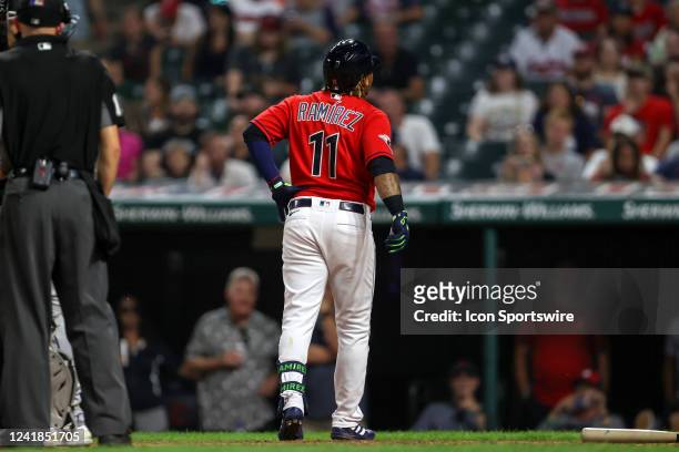 Cleveland Guardians third baseman Jose Ramirez reacts after getting hit by a pitch during the eighth inning of the Major League Baseball game between...