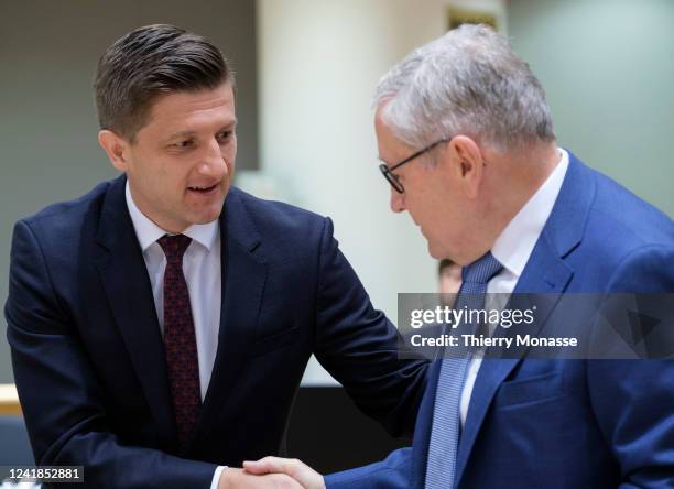 Croatian Minister of Finance Zdravko Maric is talking with the Managing Director of the European Stability Mechanism Klaus P. Regling prior the start...