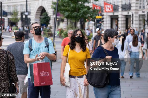 Visitors wearing face masks out on Regent Street on 11th July 2022 in London, United Kingdom. Regent Street is a major retail centre in the West End...