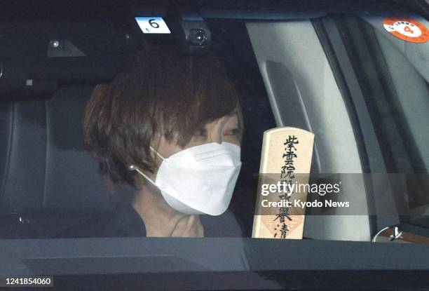 The vehicle carrying Akie Abe, widow of the late former Japanese Prime Minister Shinzo Abe, leaves Zojoji temple in Tokyo following his funeral there...