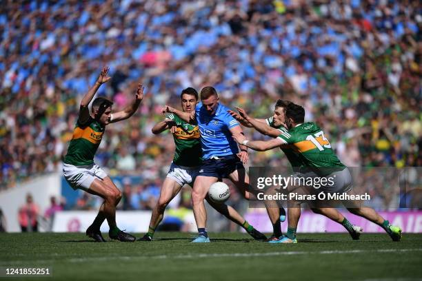 Dublin , Ireland - 10 July 2022; Ciarán Kilkenny of Dublin in action against Kerry players, from left, Graham O'Sullivan, Brian Ó Beaglaíoch, Gavin...