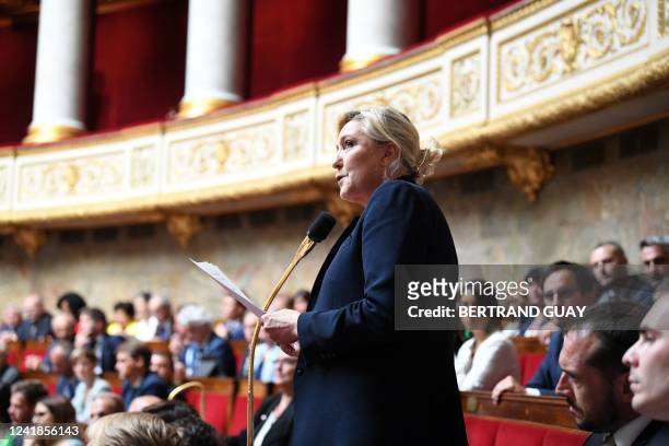 French far-right Rassemblement National leader and President of the party's parliamentary group Marine Le Pen speaks during a session of questions to...