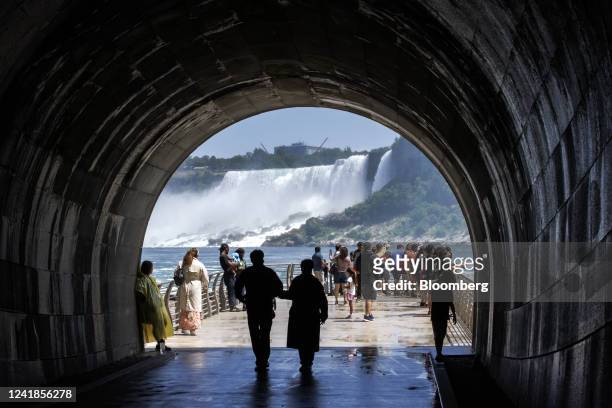 Tourists visit The Tunnel at the Niagara Parks Power Station in Niagara Falls, Ontario, Canada, on Sunday, July 10, 2022. The former Canadian Niagara...
