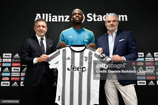 Juventus player Paul Pogba, pictured with Federico Cherubini and Maurizio Arrivabene, press conference at Allianz Stadium on July 12, 2022 in Turin,...