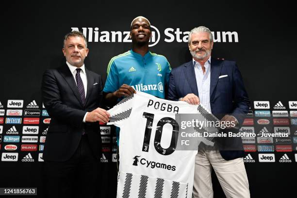 Juventus player Paul Pogba, pictured with Federico Cherubini and Maurizio Arrivabene, press conference at Allianz Stadium on July 12, 2022 in Turin,...