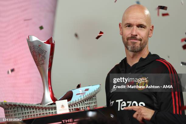 Erik Ten Hag the manager / head coach of Manchester United holding the winners The Match Bangkok Century Cup 2022 trophy during the preseason...