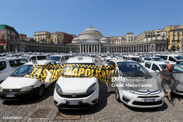 Over 500 taxis in Plebiscito square in Naples, due to the protest of taxi drivers, against the Italian government, for the deregulation of the...