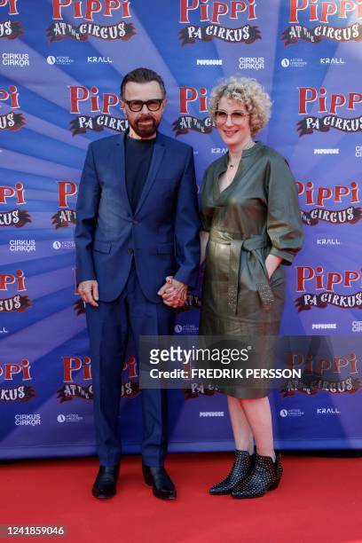 Member of Swedish disco group ABBA and executive producer of "Pippi at the Circus" Bjorn Ulvaeus poses with Universal Music Group Manager Christina...