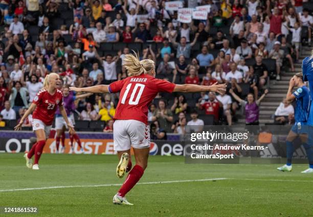 Pernille Harder of Denmark celebrates scoring her side's first goal during the UEFA Women's Euro England 2022 group B match between Denmark and...