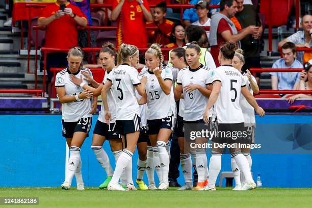 Klara Buehl of Germany celebrates after scoring his team's first goal with teammates during the UEFA Women's Euro England 2022 group B match between...