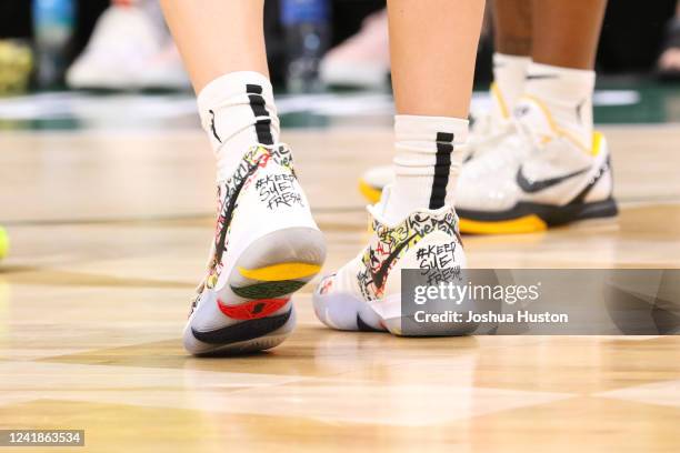 The sneakers worn by Sue Bird of the Seattle Storm during the game against the Dallas Wings on July 12, 2022 at the Climate Pledge Arena in Seattle,...