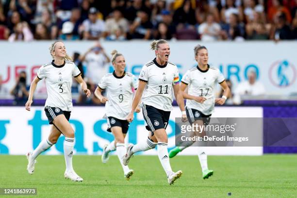 Alexandra Popp of Germany celebrates after scoring her team's second goal with teammates during the UEFA Women's Euro England 2022 group B match...