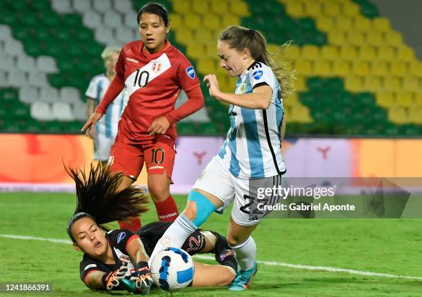 Estefania Romina Banini of Argentina and Maryory Sanchez goalkeeper of Peru fight for the ball during a match between Argentina and Peru as part of...