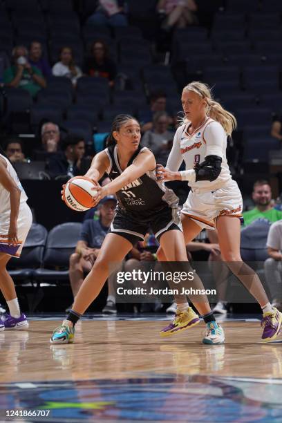 Natalie Achonwa of the Minnesota Lynx handles the ball during the game against the Phoenix Mercury on July 12, 2022 at the Target Arena in...