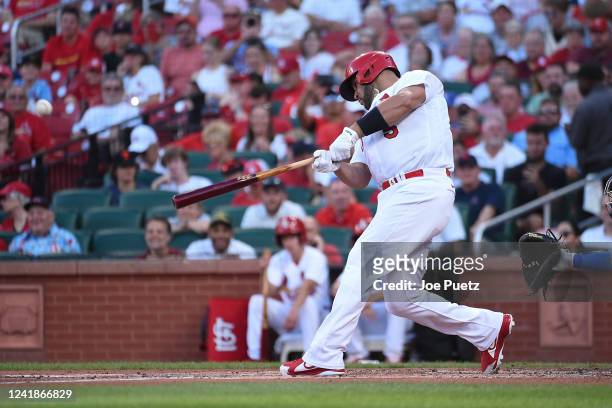 Albert Pujols of the St. Louis Cardinals hits a solo home run against the Los Angeles Dodgers in the second inning at Busch Stadium on July 12, 2022...