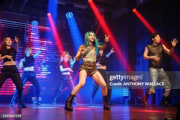 In this photo taken on July 2 Korean-American K-pop star AleXa , who recently won the American Song Contest, dances with her crew during a mini...