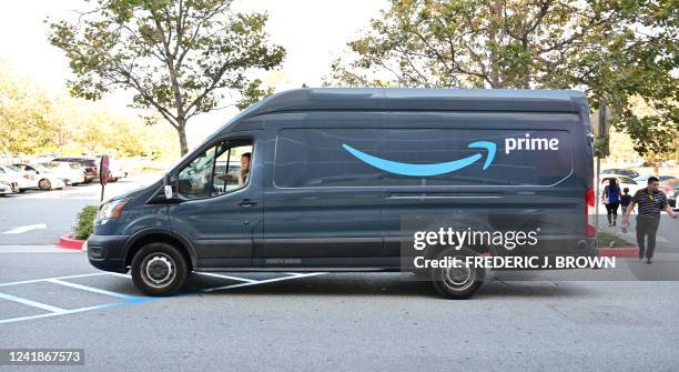 An Amazon delivery van is seen during Amazon Prime Day on July 12, 2022 in Alhambra, California. What started as a one-day-only event for shopping...