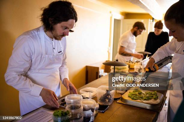 Double-Michelin-starred Faroese chef of KOKS restaurant Poul Andrias Ziska prepares food at the kitchen of the restaurant housed in the Poul Egedes...