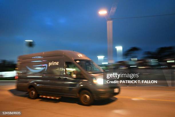 An Amazon Prime delivery van drives to Amazon.com Inc. Delivery hub in the late evening of Amazon Prime Day, July 12, 2022 in Culver City,...